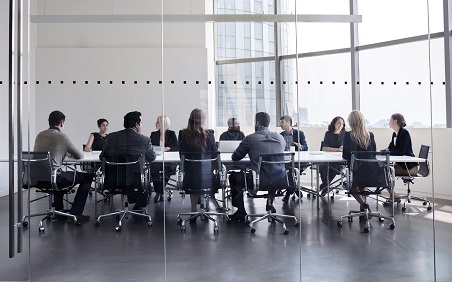 Colleagues at business meeting in conference room